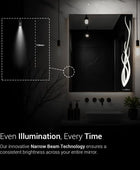  Illuminated rectangular bathroom mirror with Even Illumination Narrow Beam Technology. This technology ensures consistent brightness across the entire mirror's surface. The mirror is mounted above a bathroom sink with a countertop in a modern bathroom.