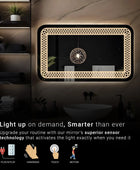 Illuminated bathroom mirror with hi tech sensor technology. Text overlay: 