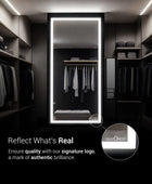 Glazonoid Full-length mirror in a brightly lit walk-in closet. This modern LED mirror is frameless and provides bright  light, perfect for checking your outfit before you go out.