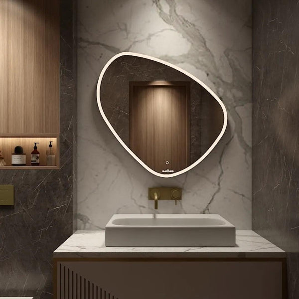 A close up of a modern bathroom vanity with a rectangular sink and a large LED mirror above the sink with a brushed nickel faucet. The mirror contains a touch sensor to control the LED light.