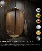 A luxury bathroom vanity set featuring a gold framed mirror and a matching gold framed medicine cabinet with a mirrored door. The mirror is mounted on the wall above a dark gray quartz countertop with a modern faucet in a brushed nickel finish. Several colors of metal are being displayed for the finish of the metal.