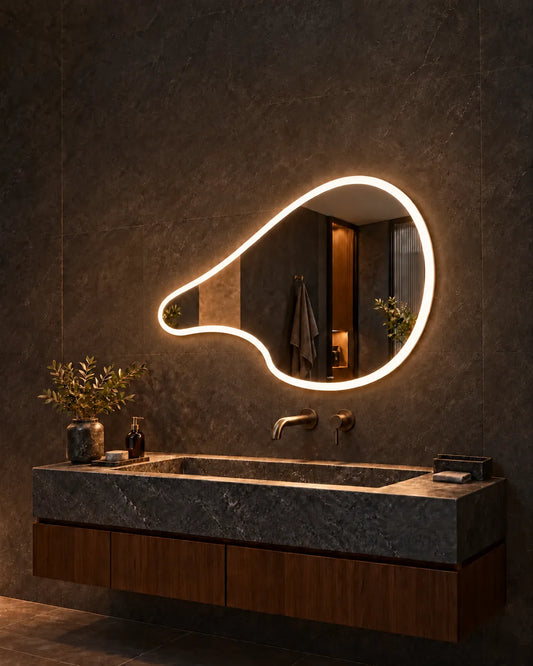 Glazonoid Liquid Comet bezel-less LED mirror in a luxury bathroom