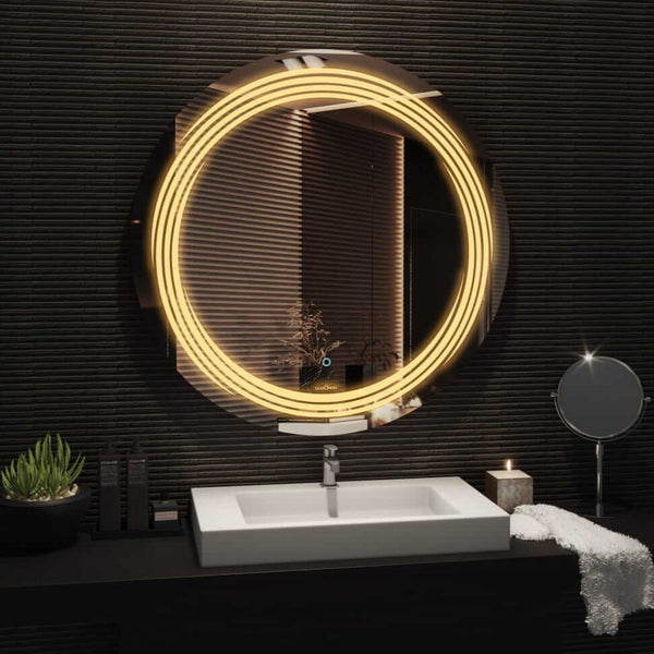 led wall mirror above white washbasin